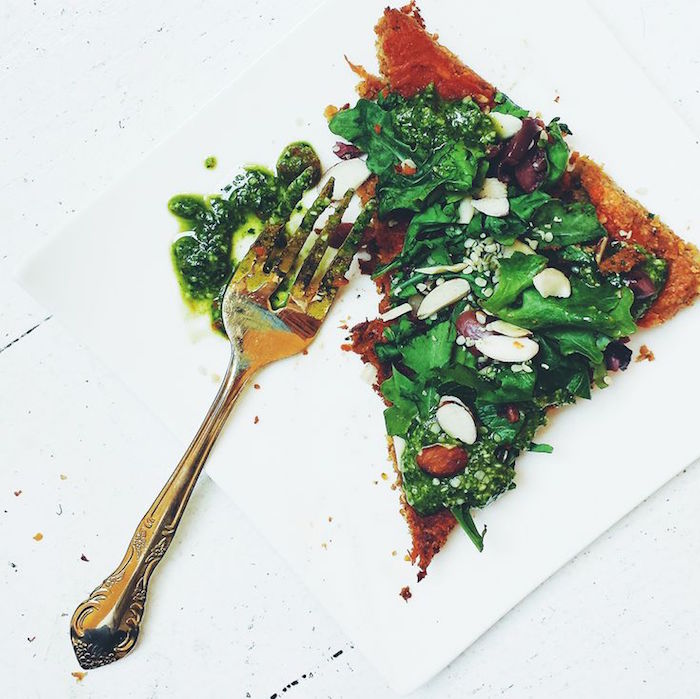 Cauliflower crust vegan pizza slice from Sakara Life on Thenuminous.net